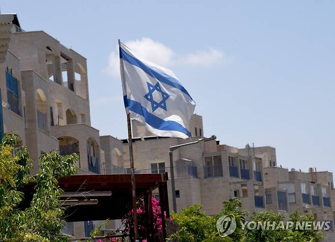 예루살렘 남쪽 유대인 정착촌에 흔들리는 이스라엘 국기 [UP 연합뉴스 자료사진. 재배포 및 DB 금지]