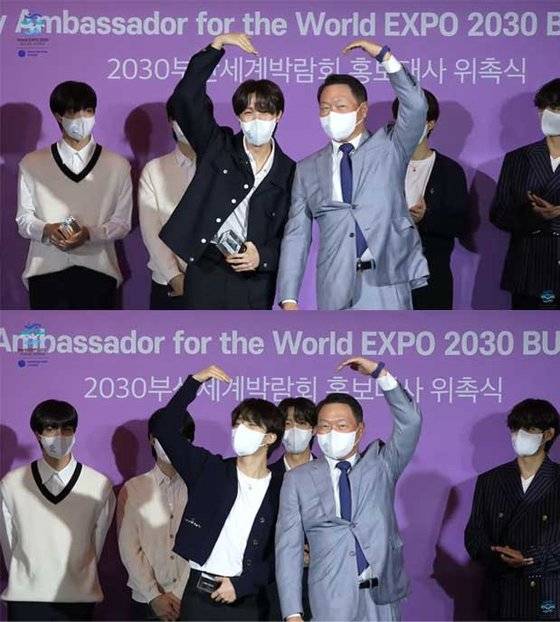 제이홉과 지민에게 위촉패를 수여한 뒤 머리 위로 하트를 그린 최태원 대한상의 회장. [유튜브 캡처]