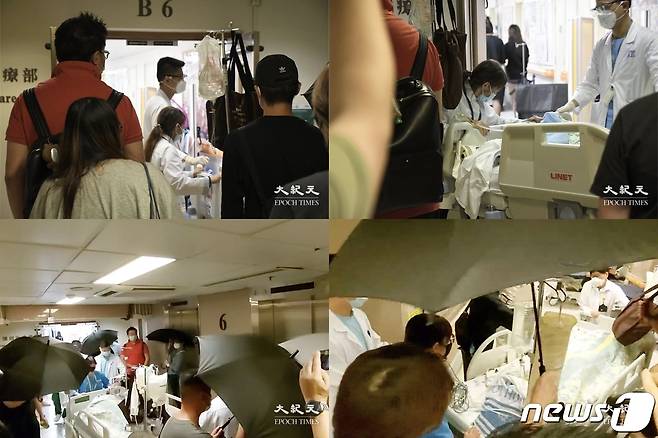 스크린 추락 사고로 병원에 이송된 2명의 댄서. (트위터 갈무리) ⓒ 뉴스1