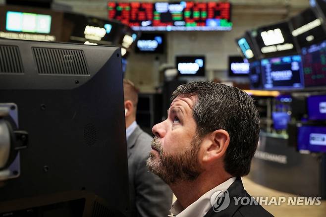 NYSE 입회장에 트레이더의 모습