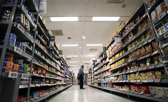 A shopper browses the aisles at a large mart in Seoul on August 8. [NEWS1]