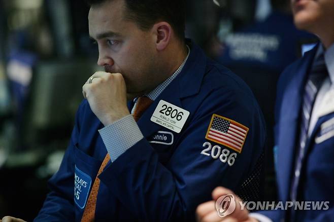 NYSE 입회장에 트레이더의 모습