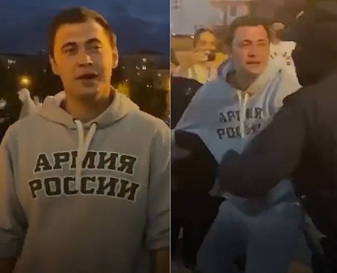 한 러시아 청년이 예비군 동원령을 찬성한다는 인터뷰를 한 직후 경찰로 보이는 요원들에게 끌려가는 모습. /@Gerashchenko_en 트위터