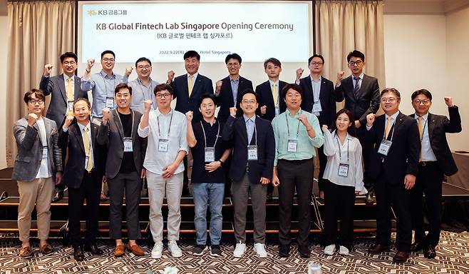 Officials from KB Financial Group, Gomi, SsenStone, Wavebridge and Horizon Technology pose for a photo during a launch ceremony for KB Global Fintech Lab in Singapore on Thursday. (KB Financial Group)