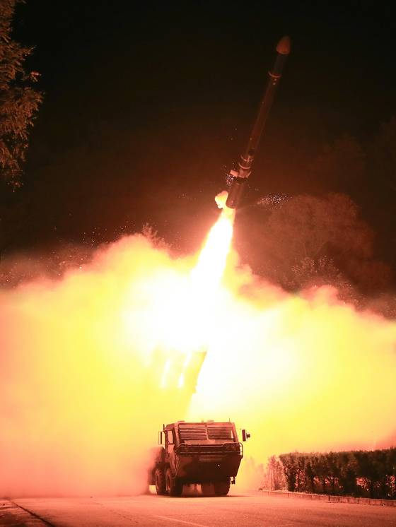 North Korea's state-run Rodong Sinmun on Thursday released this photo of one of two long-range strategic cruise missiles fired by the regime on Wednesday. [NEWS1]