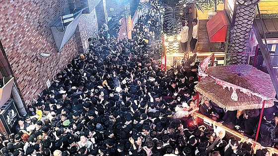 An aerial shot of the Itaewon stampede near the Hamilton Hotel in Yongsan District, central Seoul, on Saturday night [YONHAP]