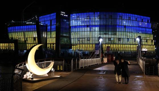 The Sevit Island is lit in the colors of the Ukraine national flag on Feb. 27. [YONHAP]