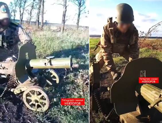 우크라이나 군인들이 퇴각한 러시아군이 남기고 간 1910년식 기관총을 살펴보고 있다./트위터