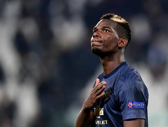 (FILES) In this file photo taken on November 07, 2018 Manchester United's French midfielder Paul Pogba acknowledges the public at the end of the UEFA Champions League group H football match Juventus vs Manchester United at the Allianz stadium in Turin. Paul Pogba will miss the upcoming World Cup for France as he needs more time to recover from knee surgery, his agent announced on October 31, 2022. (Photo by Miguel MEDINA / AFP)







<저작권자(c) 연합뉴스, 무단 전재-재배포 금지>