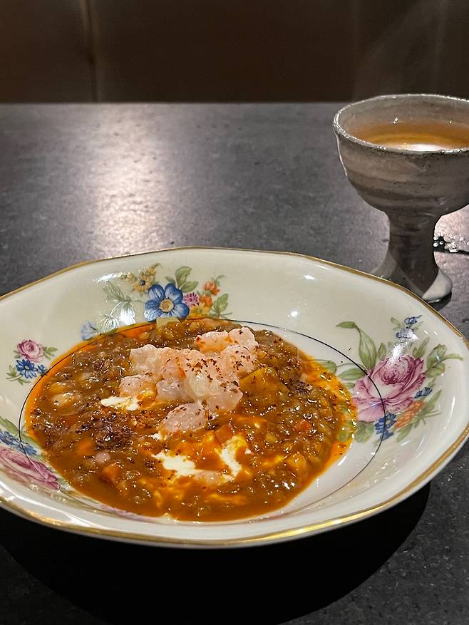 Donghae sweet shrimp rice, with shrimp bisque, buffalo burrata and sweet potatoes (Courtesy of the restaurant)