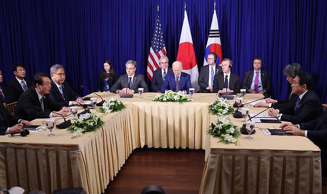 President Yoon Suk-yeol speaks at the summit with the US and Japan held on the sidelines of the ASEAN Summit in Cambodia on Sunday. (Yonhap)