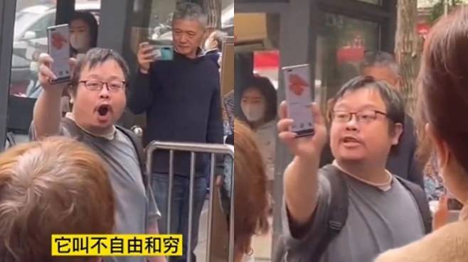 PCR 검사소 앞에서 방역정책 비판하는 중국 남성 [트위터 캡처. 재판매 및 DB 금지]