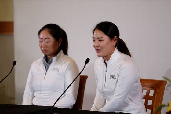 Mina Harigae of the United States, left, and Ryu So-yeon speak during an event after the LPGA announced that the Hanwha Lifeplus International Crown will return to the schedule in 2023 at TPC Harding Park on Oct. 11 in San Francisco, California.  [GETTY IMAGES/LPGA]