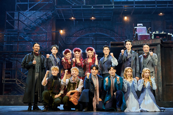 The cast of 2022 Korean production of musical "Sweeney Todd" pose for photos after a press event at Charlotte Theater in Songpa District, southern Seoul, on Tuesday. [OD COMPANY]