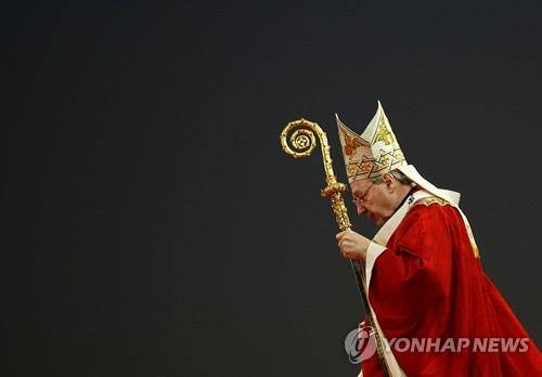 미사 집전하는 조지 펠 추기경 [로이터 연합뉴스 자료사진. 재판매 및 DB 금지]