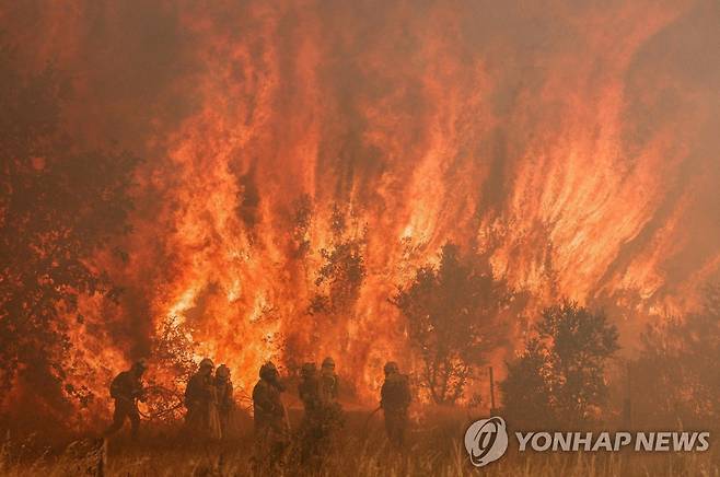 지난해 기후변화에 따른 폭염과 산불로 고통받은 스페인  [AFP 연합뉴스 자료사진. 재판매 및 DB 금지]