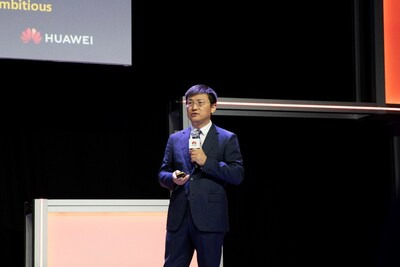 Zhou Haojie, COO of Huawei Electric Power Digitalization Business Unit, unveiles four new solutions at the summit. (PRNewsfoto/Huawei)