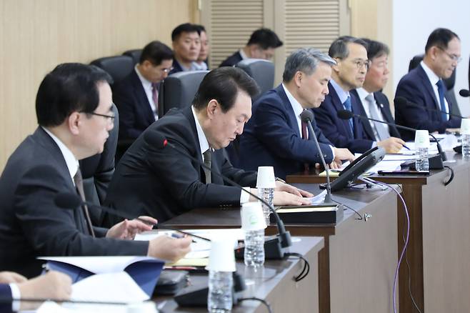 President Yoon Suk Yeol attends a meeting of the National Security Council at the presidential office in Seoul on Thursday to discuss countermeasures against North Korea`s firing of an intercontinental ballistic missile (ICBM) into the East Sea.(Yonhap)