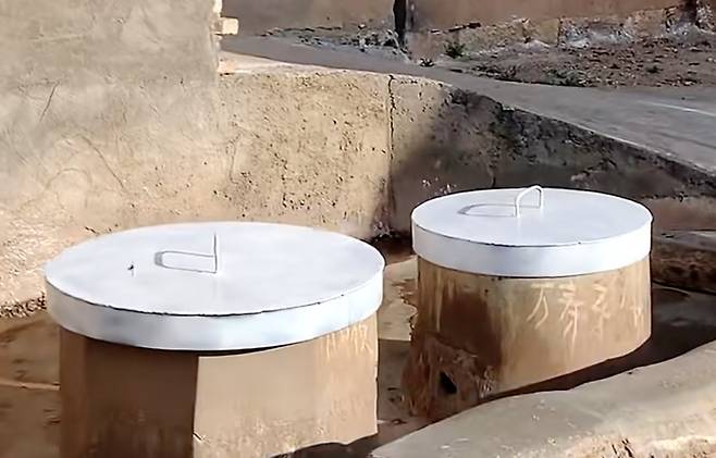 사건이 발생한 우물의 모습. 철로 만들어진 뚜껑으로 덮여있다. [바이두 갈무리]