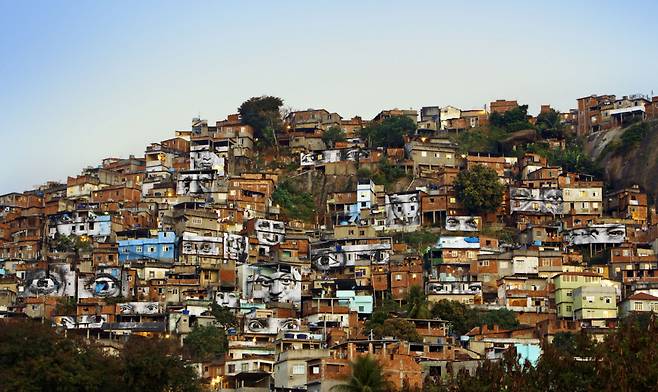 "Women Are Heroes, Action in Favela Morro da Providencia, Favela by Day, Rio de Janeiro" by JR (JR-ART.NET)