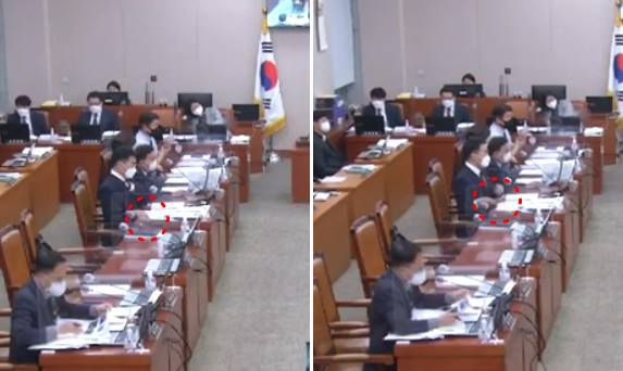 김남국 더불어민주당 의원이 한동훈 법무부장관의 답변이 끝나자 책상 위에 올려뒀던 휴대전화를 집어 들고 있다./국회방송