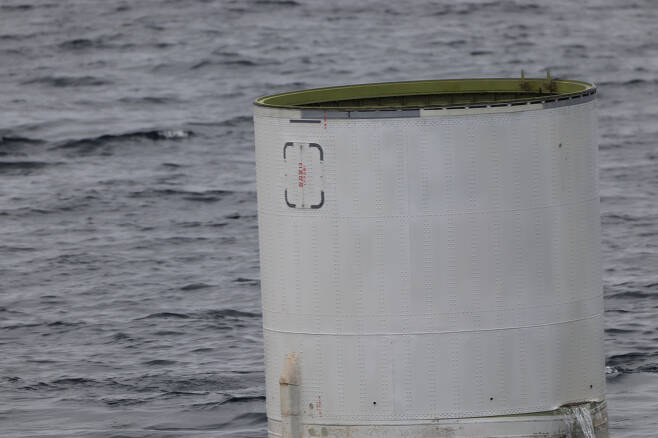 This photo shows an object believed to be part of North Korea's "space launch vehicle" that is salvaged by the South Korean military from the Yellow Sea on Wednesday morning. (South Korea's Joint Chiefs of Staff)