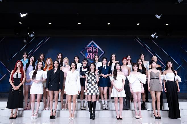 Participants in Mnet's new girl group survival show, "Queendom Puzzle," attend a press conference in Seoul on Tuesday. (Mnet)