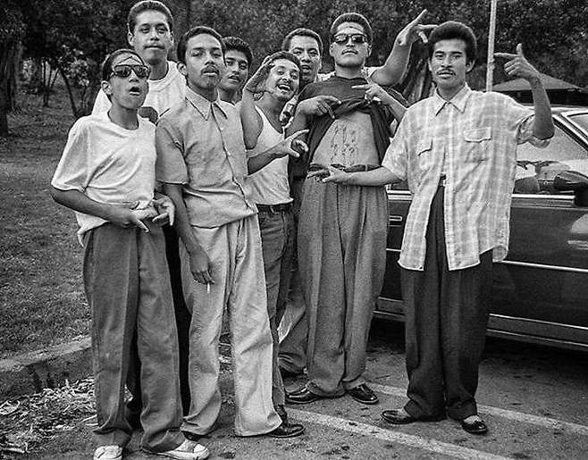 Portrait of Homeboys at Elysian Park-Los Angeles 1984 by Merrick Morton.