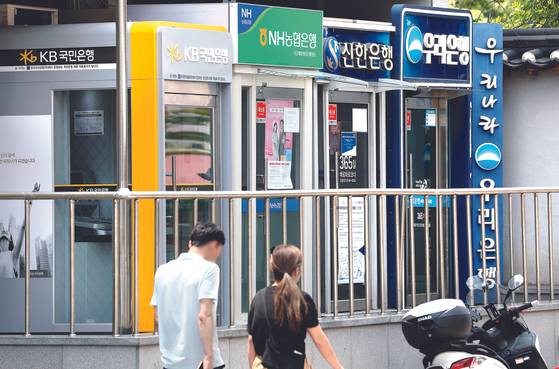 Booths for automated teller machines of major commercial banks are seen in Seoul. [NEWS1]