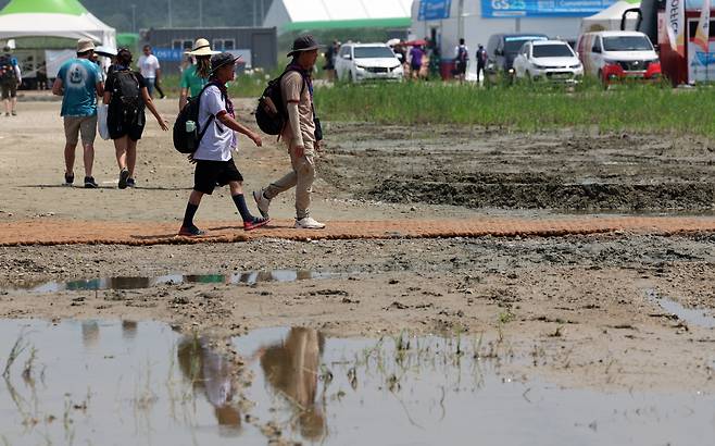 A part of the World Scout Jamboree venue in Saemangeum, Buan County, North Jeolla Province, is submerged, on Tuesday, the opening day of the international event. (Yonhap)