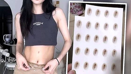 중국 여성들 중에 노출이 많은 여름을 맞아 가짜 배꼽 스티커를 붙이는 것이 유행이라고 홍콩 매체가 보도했다. 사진 QQ닷컴 홈페이지 캡처