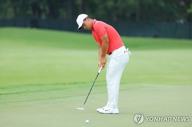 퍼팅하는 김주형 [게티이미지/AFP=연합뉴스]