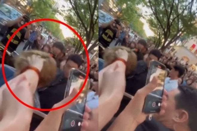 그룹 방탄소년단(BTS) 멤버 뷔가 일본 도쿄 셀린느 오모테산도점을 방문한 후 이동을 위해 차량에 탑승하려는 순간 일본의 한 극성팬에게 머리채를 잡혔다. /사진=X(구 트위터) 캡처