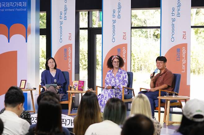 From left: Poet Jin Eun-young, writer Bernardine Evaristo and literary critic Song Jong-won take part in a "One on One" conversation at the Seoul International Writers' Festival, in Seoul, Saturday. (SIWF, LTI Korea)