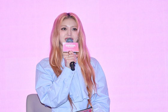 Singer Jeon Somi, one of the co-hosts of this year's MAMA Awards, answers questions from reporters during a press conference held on Wednesday in southern Seoul as a preview to the upcoming 2023 MAMA Awards music ceremony set to take place on Nov. 28 and 29. [CJ ENM]