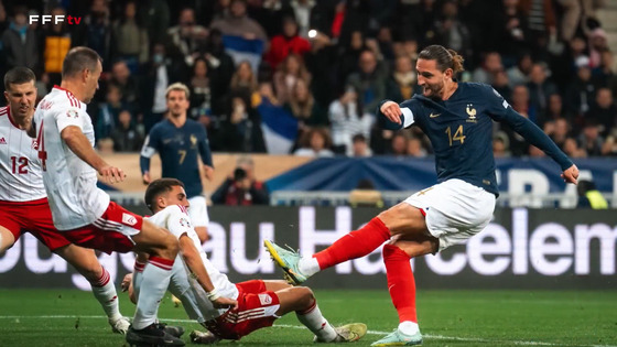 France's Adrien Rabiot, right, shoots during a Euro 2024 qualifier against Gibraltar. [ONE FOOTBALL]