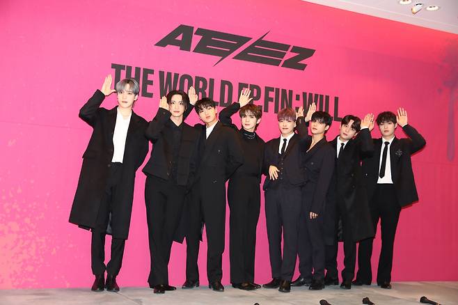 Ateez introduces its LP "The World Ep. Fin: Will" at a press conference in Seoul on Friday. (KQ)