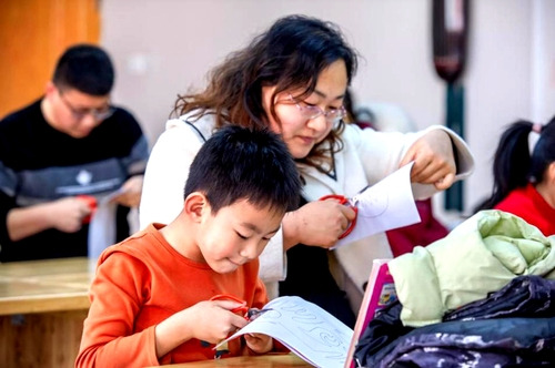 A scene of the paper-cutting activity