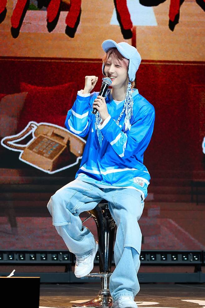 Hui holds a press conference in Seoul on Tuesday to introduce his 1st EP, "Whu Is Me: Complex." (Cube Entertainment)