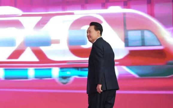 South Korean President Yoon Seok-yul attends a ceremony to mark the groundbreaking of GTX-C at the Uijeongbu City Hall multipurpose gymnasium in Uijeongbu, Gyeonggi-do, South Korea, Friday. Courtesy of the presidential office-Yonhap