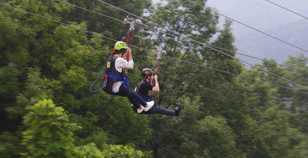 Visitors ride the Mancheonha Zipline. (Mancheonha Skywalk)