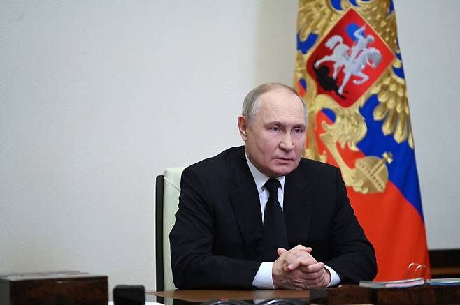 블라디미르 푸틴 러시아 대통령이 23일(현지시각) 모스크바에서 발생한 총격 테러와 관련해 대국민 연설을 하고 있다./로이터 연합뉴스