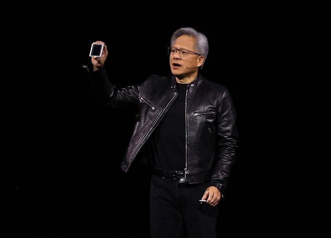 Nvidia CEO Jensen Huang delivers a keynote address during the Nvidia GTC Artificial Intelligence Conference at SAP Center on March 18, 2024 in San Jose, California. (AFP-Yonhap)