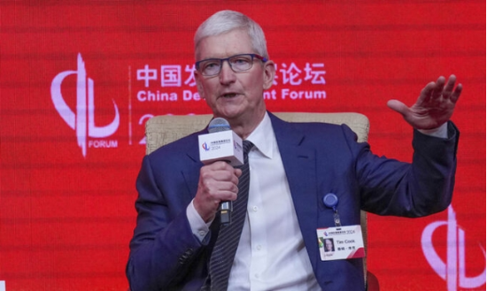 지난 24일 중국 베이징에서 개최된 중국발전포럼에 참석한 팀 쿡 애플 CEO. (출처=AP연합뉴스)