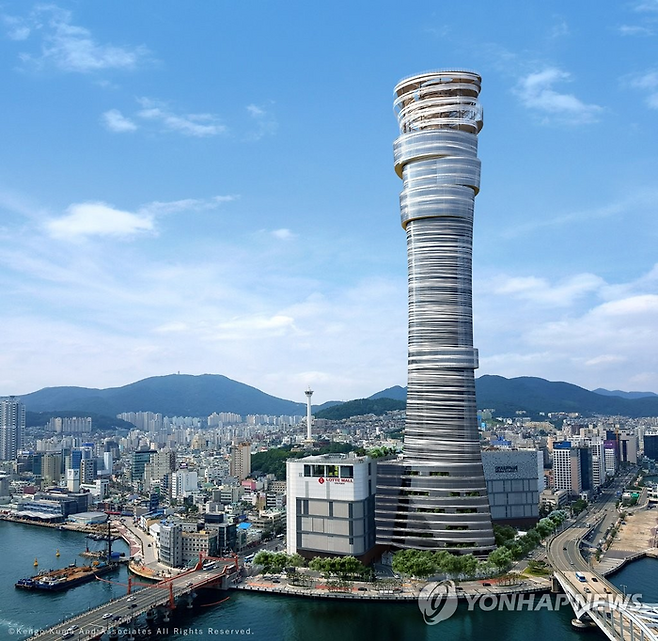 지난해 8월 착공에 들어간 부산롯데타워 조감도. 2026년 완공 계획이었지만 설계변경으로 인해 완공이 늦어질 것으로 우려된다.  [연합뉴스]