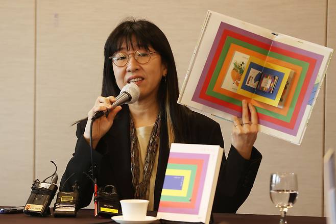 Lee Suzy speaks during a press conference in Seoul in March. (Yonhap)