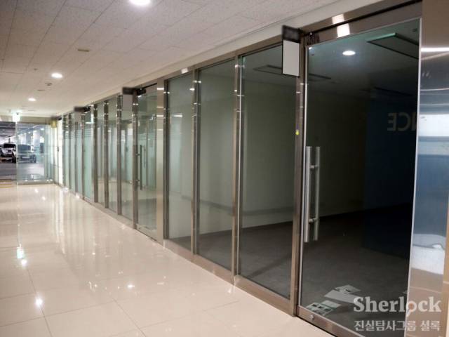 ▲사채왕 김상욱 일당의 대출사기에 담보로 사용된 KC월드카프라자 내 빈 상가들 ⓒ셜록