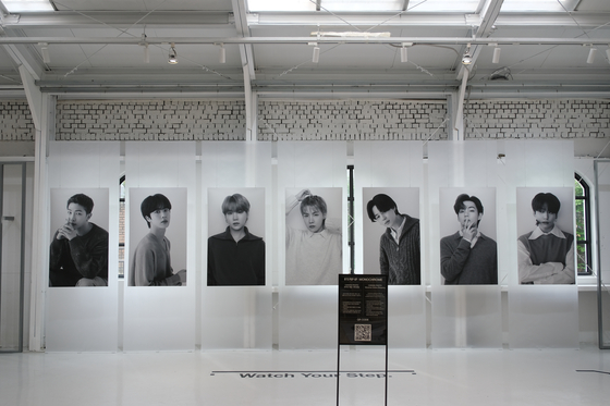 Each member has an individual canvas picture, with group pictures elsewhere in the store. [CHO YONG-JUN]