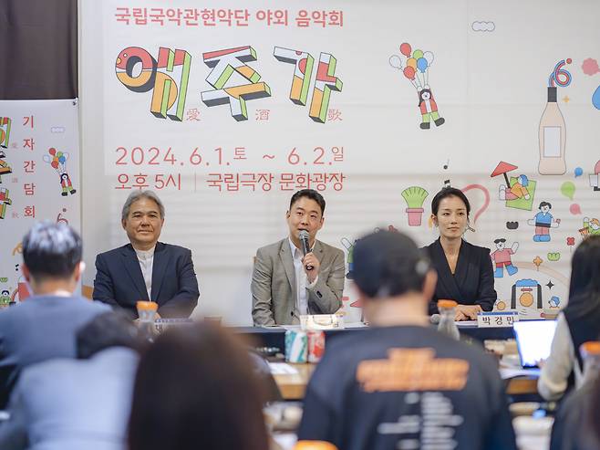 (From left) The National Orchestra of Korea's Artistic director Chae Chi-seong, director of "Aejuga" Jeong Jong-im and daegeum player Park Kyoung-min attend a press conference held at Gangnam's Kooksoondang Brewery on Monday. (National Orchestra of Korea)