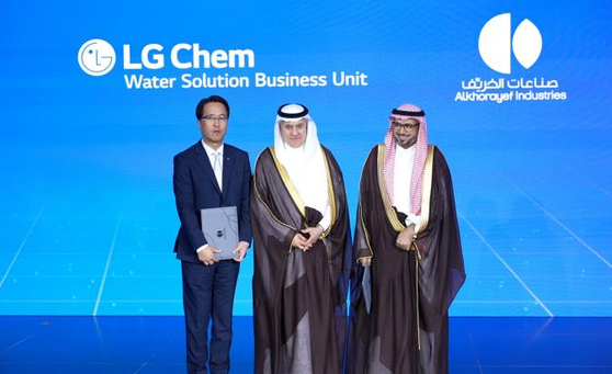 LG Chem Vice President Hyung Hoon, left, poses for a photo with Saudi Environment Minister Abdulrahman bin Abdulmohsen Al Fadley, center, and Alkhorayef Group CEO Mohammad Bin Abdullah Al-Khorayef after signing a partnership deal to build an RO membrane plant in Saudi Arabia by 2026 during during the Saudi Water Forum 2024 held at Hilton Riyadh Hotel & Residences in Saudi Arabia [LG CHEM]